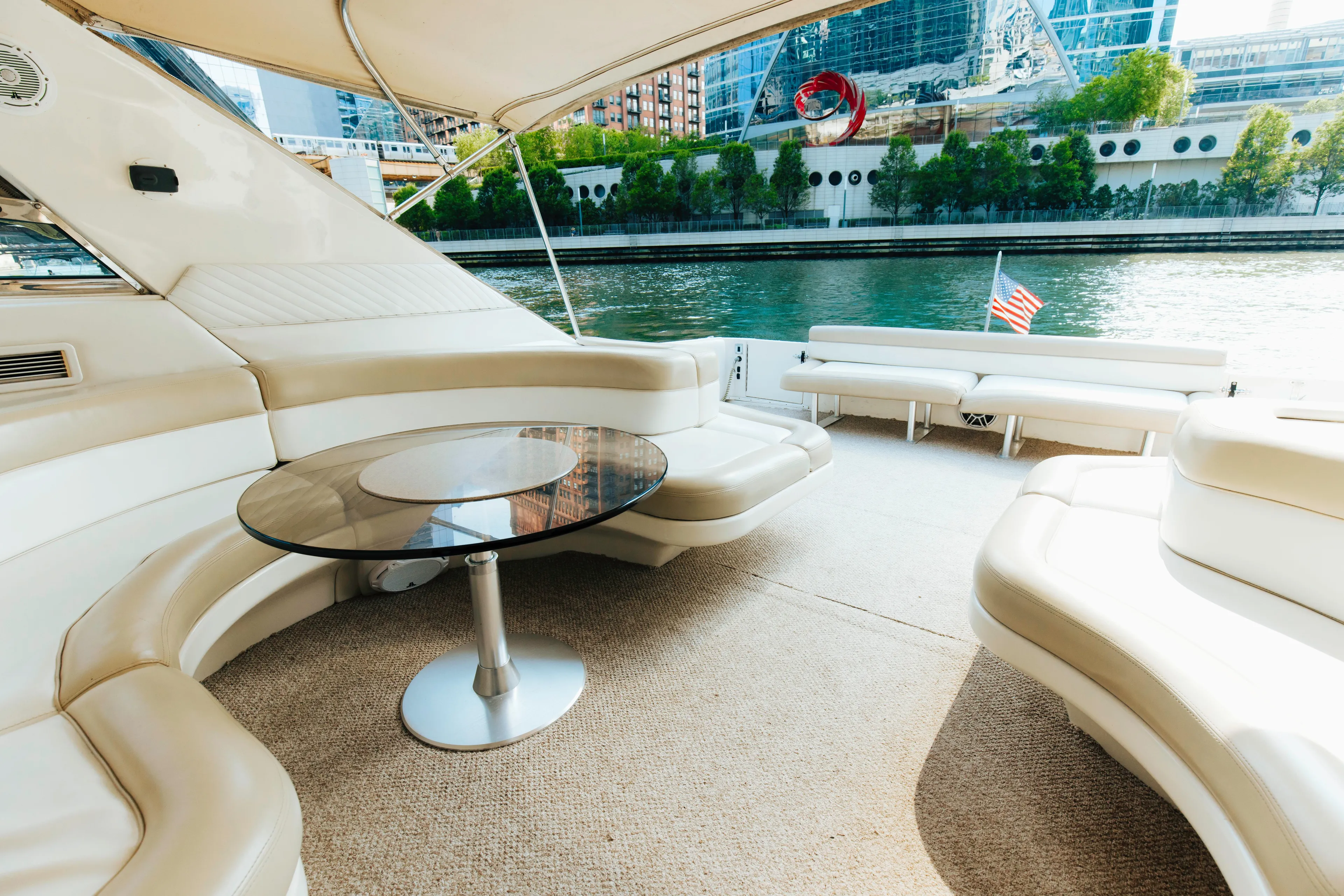  Yacht Photos Pics Luxurious 1997 Sea Ray 630 Super Sun Sport yacht interior with elegant seating and river view.