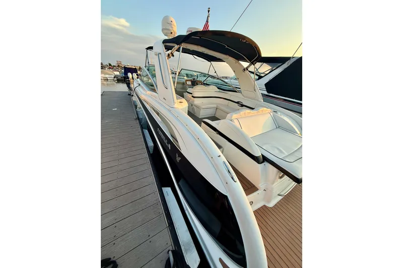  Yacht Photos Pics 2008 Formula 350 Sun Sport boat docked, featuring sleek design and spacious seating.