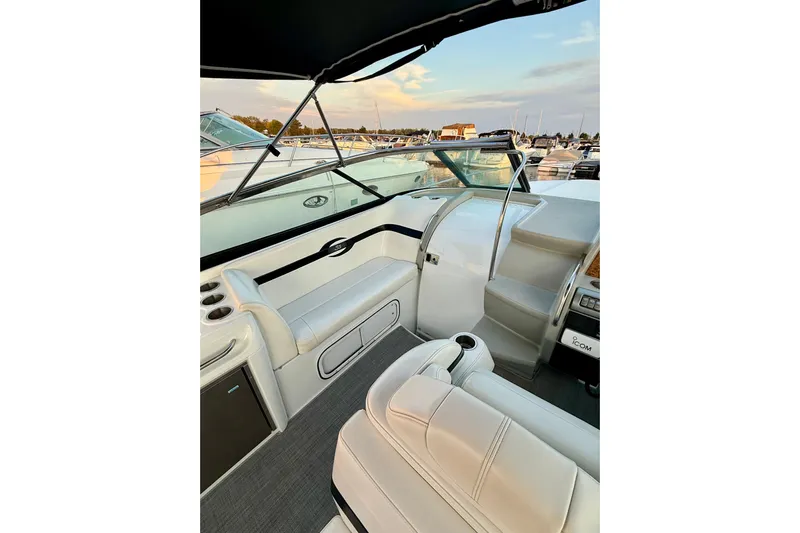  Yacht Photos Pics 2008 Formula 350 Sun Sport boat interior with white seating and dashboard view.