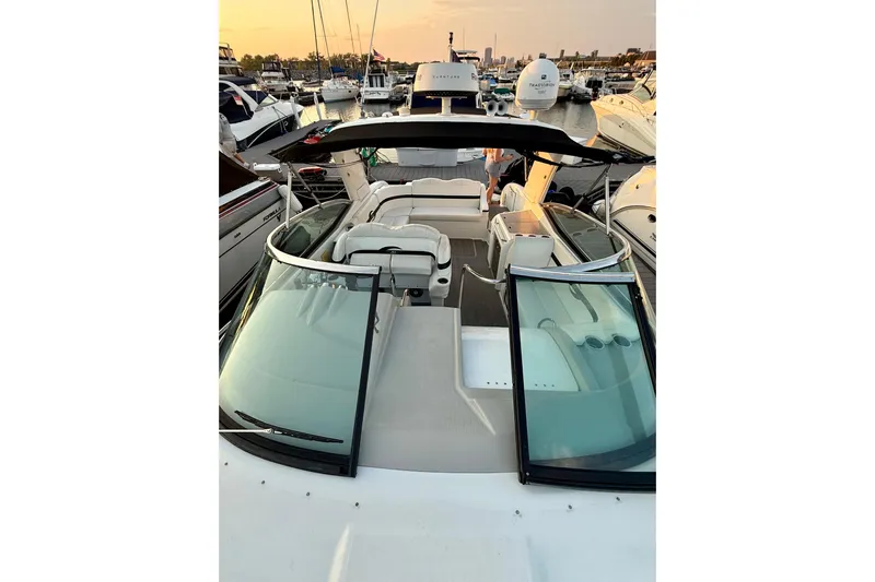  Yacht Photos Pics 2008 Formula 350 Sun Sport boat docked at marina during sunset.