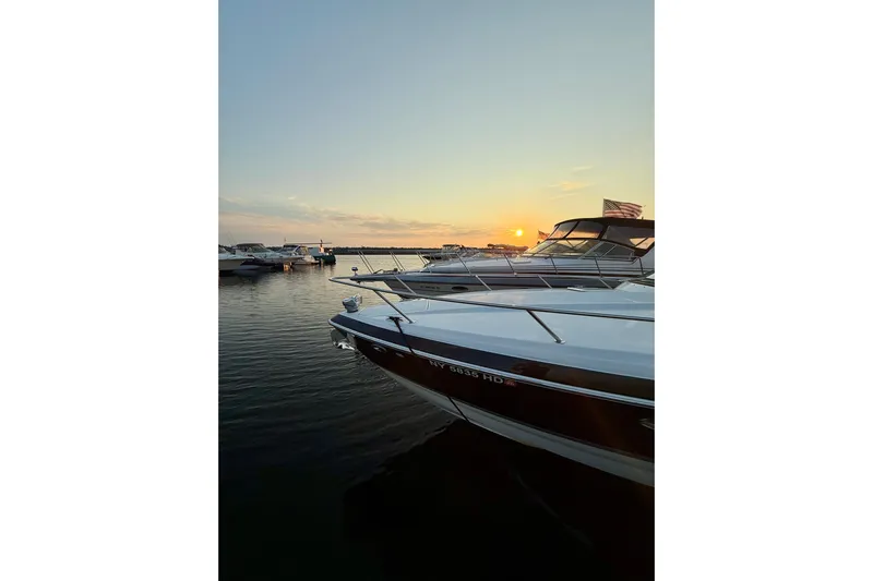  Yacht Photos Pics 2008 Formula 350 Sun Sport boat docked at sunset with calm waters.
