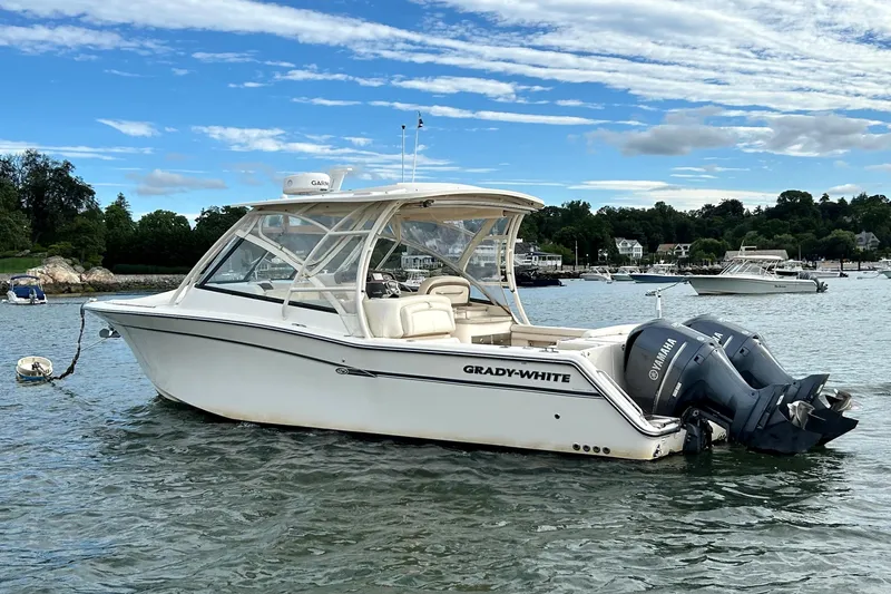 4850 Jg Yacht Photos Pics 2015 Grady-White 335 Freedom boat with twin Yamaha engines on a scenic lake.