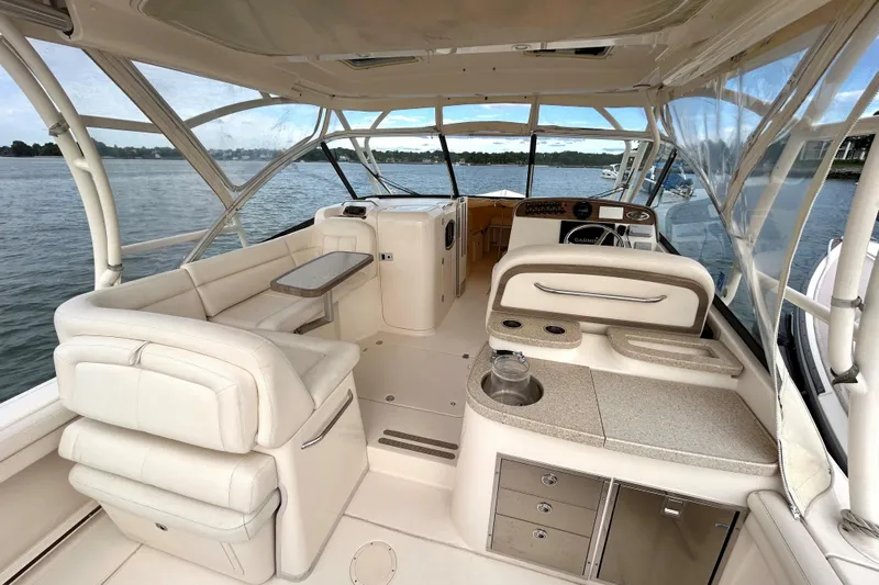 4850 Jg Yacht Photos Pics Interior of 2015 Grady White 335 Freedom boat with seating and helm, on the water.