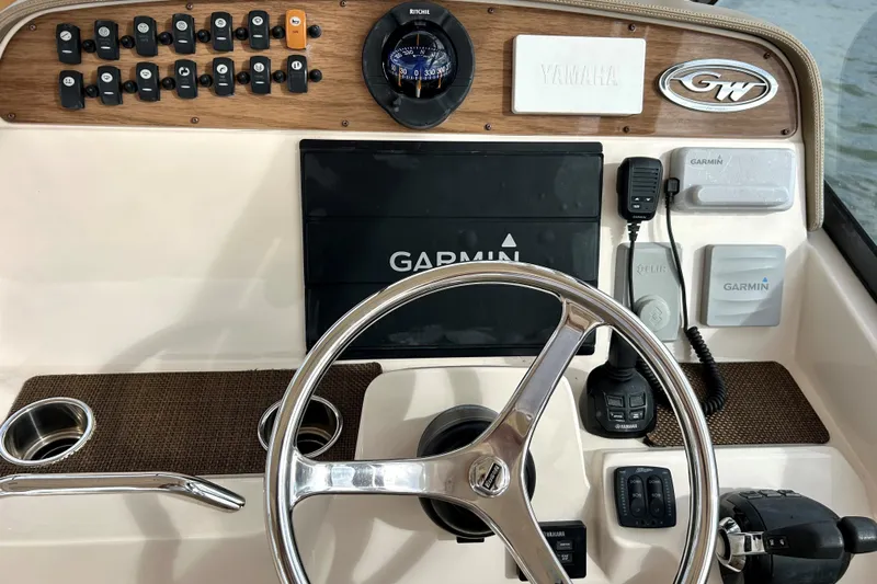 4850 Jg Yacht Photos Pics Dashboard of a 2015 Grady White 335 Freedom boat with Garmin navigation.