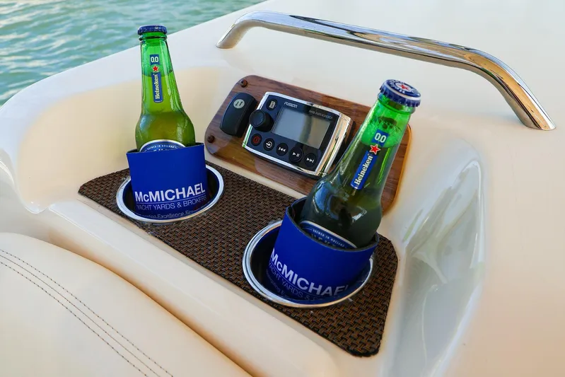 4850 Jg Yacht Photos Pics Grady White 335 Freedom boat with drinks in holders, featuring McMichael branding.