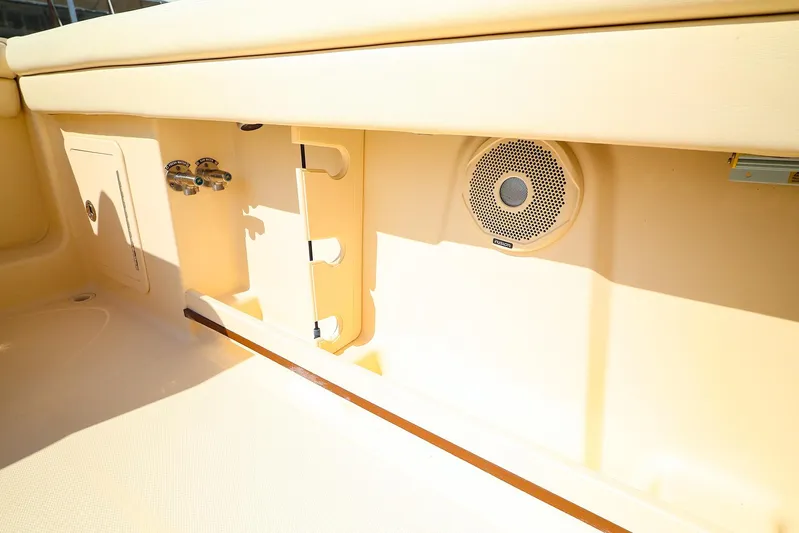 4850 Jg Yacht Photos Pics 2015 Grady White 335 Freedom boat interior with speaker and storage features.
