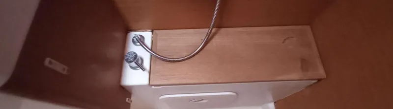 Alma Del Mar Yacht Photos Pics Interior view of 2014 Jeanneau Sun Odyssey 469 yacht bathroom fixtures.