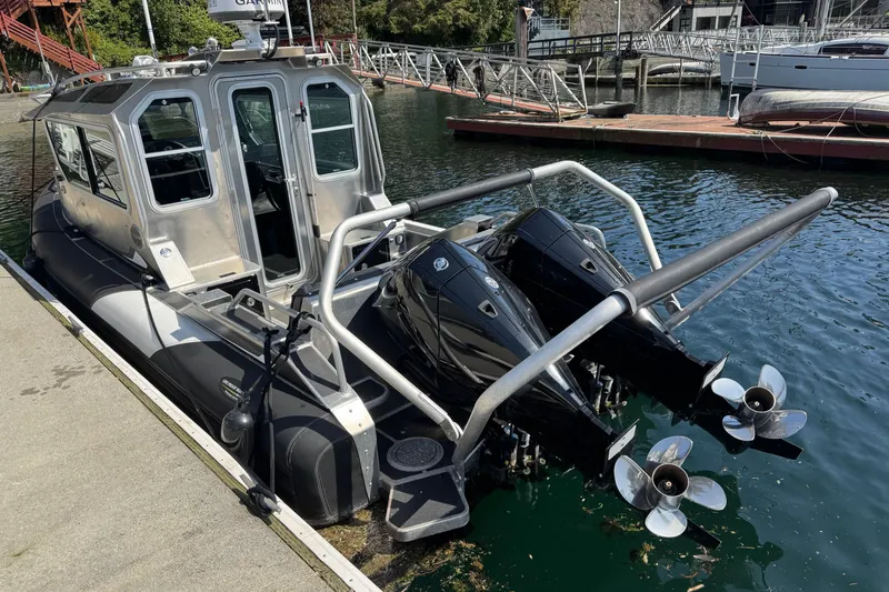  Yacht Photos Pics 2021 Life Proof 25 Full Cabin boat docked with dual outboard motors.