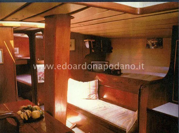  Yacht Photos Pics Interior of 1984 Classic Sciarrelli yacht with wooden furnishings and cozy seating.