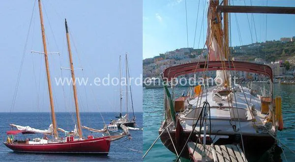  Yacht Photos Pics Classic 1984 Sciarrelli sailboat on water, showcasing elegant design and wooden masts.