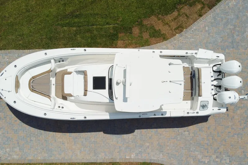  Yacht Photos Pics Aerial view of 2018 Edgewater 370 CC boat on paved surface.