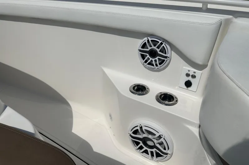  Yacht Photos Pics Interior of 2018 Edgewater 370 CC boat with speakers and cup holders.
