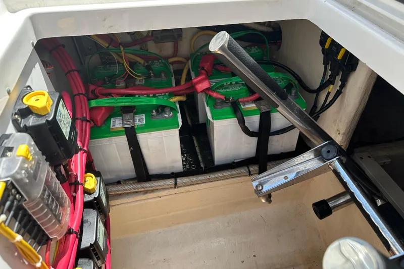  Yacht Photos Pics Battery compartment of 2018 Edgewater 370 CC boat with wiring and components.