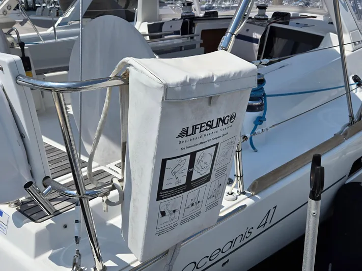 Sabrina Yacht Photos Pics Beneteau Oceanis 41 sailboat, 2013 model, featuring a Lifesling safety device on deck.