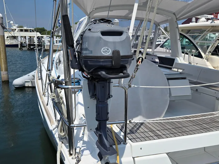 Sabrina Yacht Photos Pics 2013 Beneteau Oceanis 41 sailboat with Yamaha outboard motor, docked at marina.