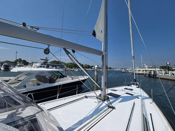 Sabrina Yacht Photos Pics Beneteau Oceanis 41 sailboat docked in a marina, clear blue sky, 2013 model.