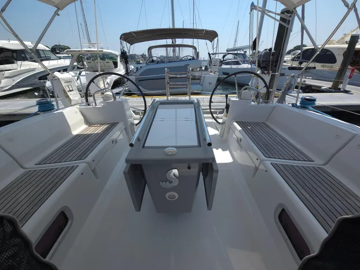 Sabrina Yacht Photos Pics Cockpit of 2013 Beneteau Oceanis 41 sailboat with dual steering wheels and seating.