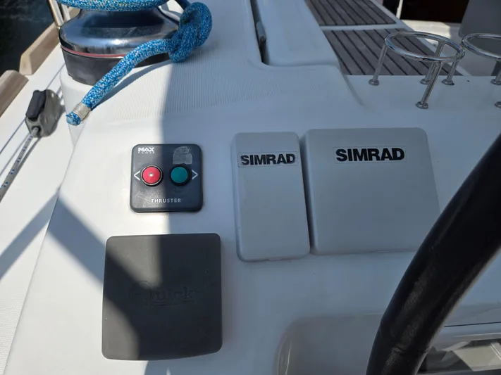 Sabrina Yacht Photos Pics Control panel on 2013 Beneteau Oceanis 41 sailboat with Simrad equipment and thruster controls.