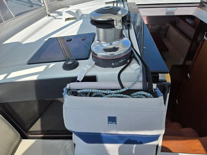 Sabrina Yacht Photos Pics Winch and rope storage on 2013 Beneteau Oceanis 41 sailboat deck.