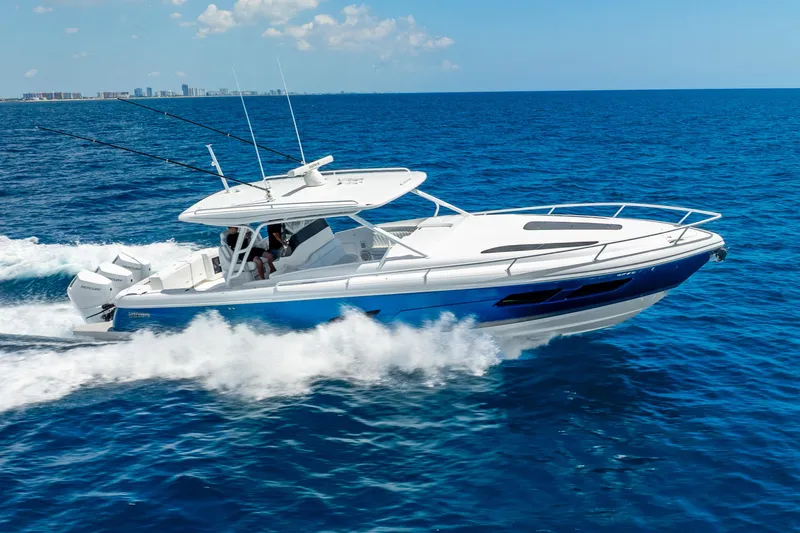  Yacht Photos Pics 2025 Intrepid 41 Valor cruising on open blue ocean waters.