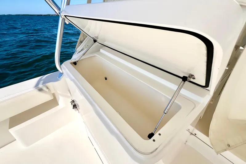 Yeah Buoy Yacht Photos Pics Open storage compartment on 2007 Albemarle 41 Express boat, with ocean view.
