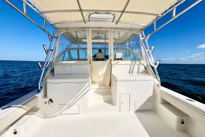 Yeah Buoy Yacht Photos Pics 2007 Albemarle 41 Express boat on open water, featuring spacious deck and clear skies.