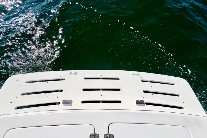 Yeah Buoy Yacht Photos Pics Rear view of 2007 Albemarle 41 Express boat on water, showing swim platform.