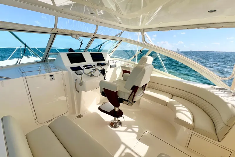 Yeah Buoy Yacht Photos Pics 2007 Albemarle 41 Express yacht helm with luxurious seating and ocean view.