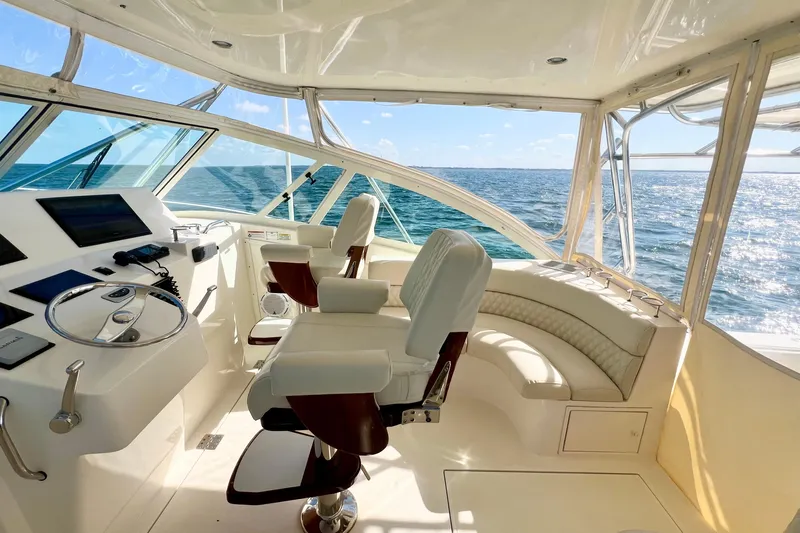 Yeah Buoy Yacht Photos Pics Luxurious 2007 Albemarle 41 Express yacht interior with ocean view and modern helm.