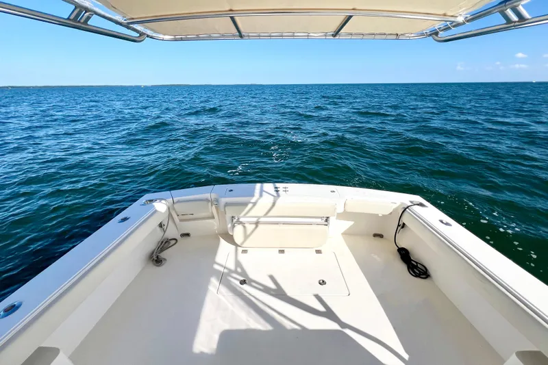 Yeah Buoy Yacht Photos Pics 2007 Albemarle 41 Express boat deck overlooking calm ocean waters.