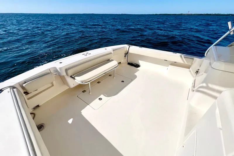 Yeah Buoy Yacht Photos Pics 2007 Albemarle 41 Express boat deck with seating, overlooking calm ocean waters.
