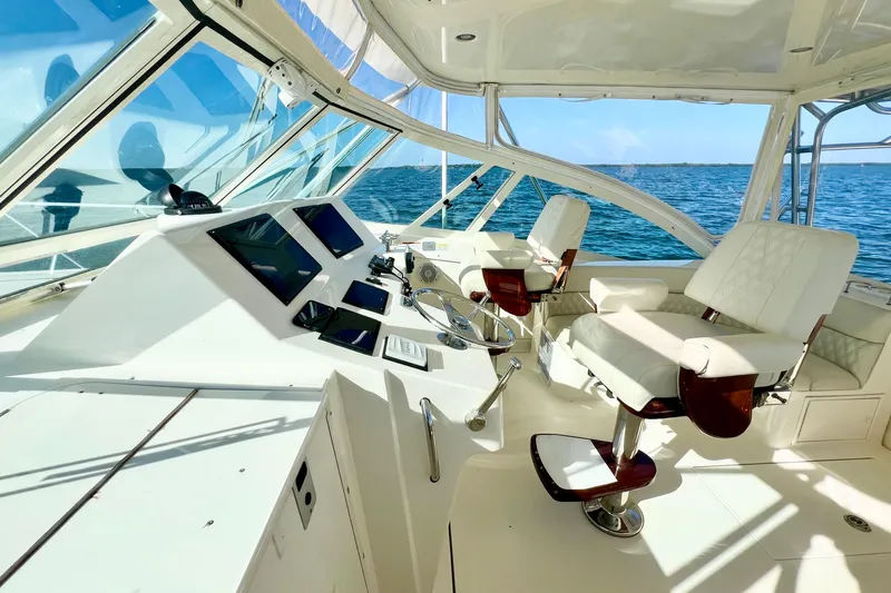 Yeah Buoy Yacht Photos Pics Luxurious helm of 2007 Albemarle 41 Express yacht with ocean view.