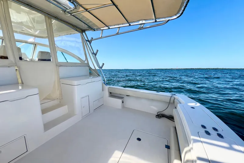 Yeah Buoy Yacht Photos Pics 2007 Albemarle 41 Express boat deck with ocean view under clear blue sky.