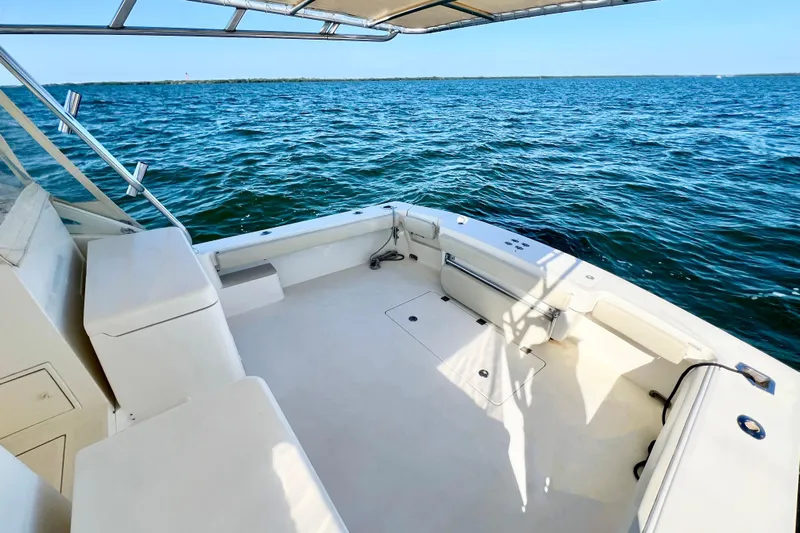 Yeah Buoy Yacht Photos Pics 2007 Albemarle 41 Express boat deck overlooking calm ocean waters.