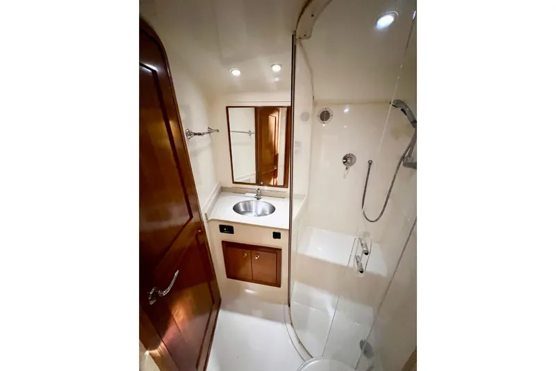 Yeah Buoy Yacht Photos Pics Luxurious bathroom in 2007 Albemarle 41 Express yacht with shower and sink.