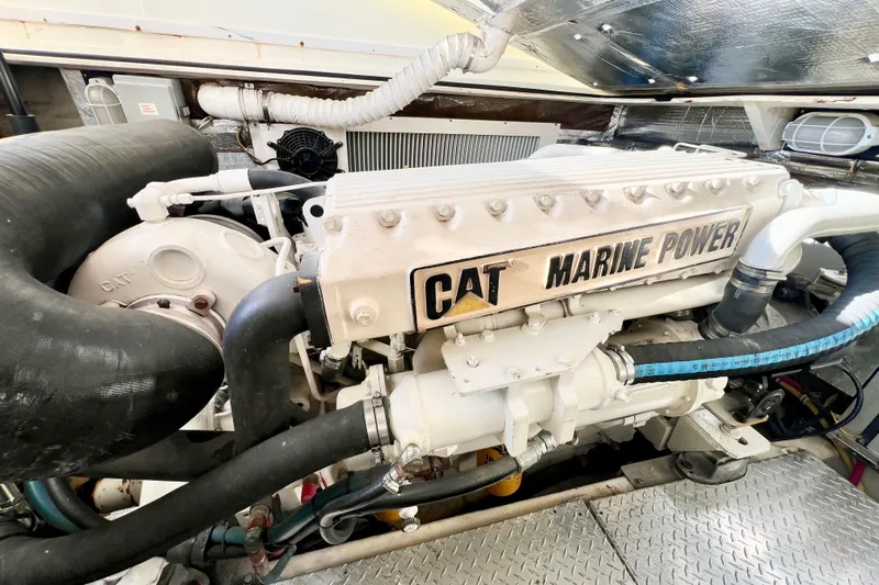 Yeah Buoy Yacht Photos Pics Engine room of 2007 Albemarle 41 Express with CAT Marine Power engine.