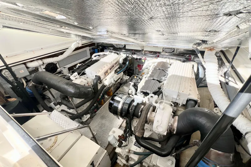 Yeah Buoy Yacht Photos Pics Engine room of 2007 Albemarle 41 Express boat, featuring dual marine engines.