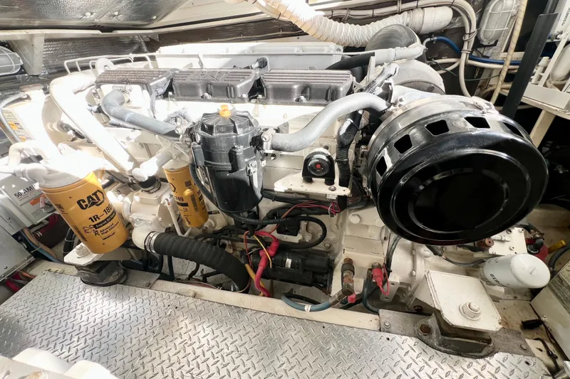 Yeah Buoy Yacht Photos Pics Engine room of a 2007 Albemarle 41 Express boat, featuring a CAT engine.