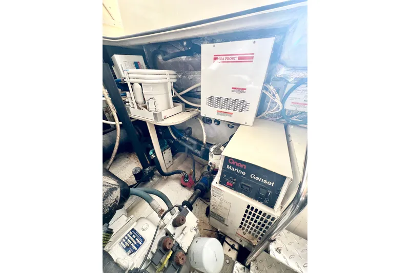 Yeah Buoy Yacht Photos Pics Engine room of 2007 Albemarle 41 Express with Onan Marine Genset and Sea Frost system.