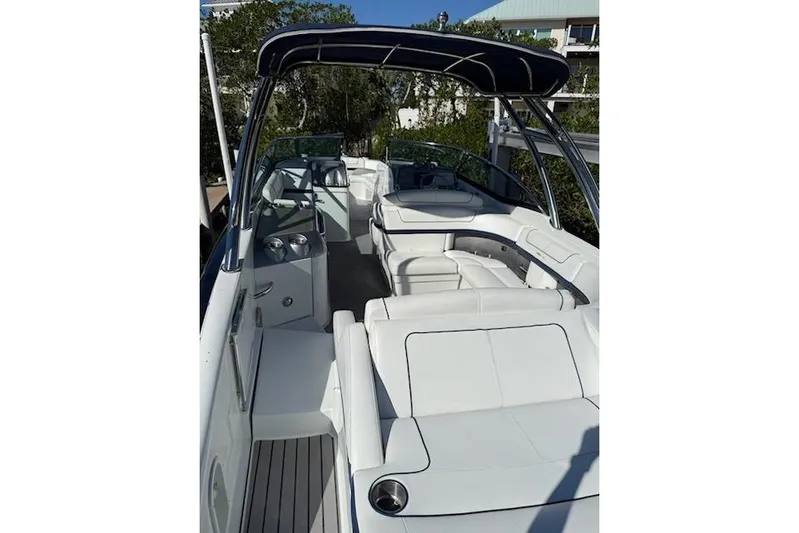  Yacht Photos Pics 2015 Formula 310 Bowrider with spacious white seating and sleek design.