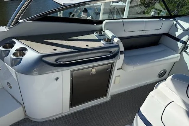  Yacht Photos Pics 2015 Formula 310 Bowrider interior with seating, cup holders, and storage.