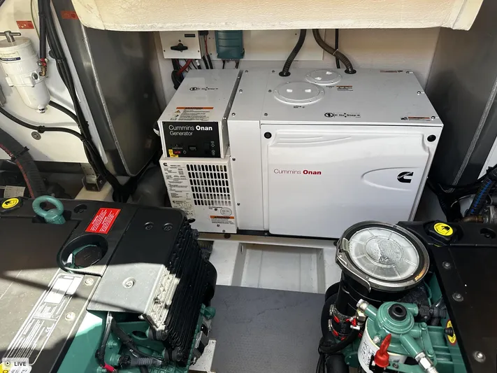  Yacht Photos Pics Engine room of 2018 Prestige 460S Coupé with Cummins Onan generator and machinery.