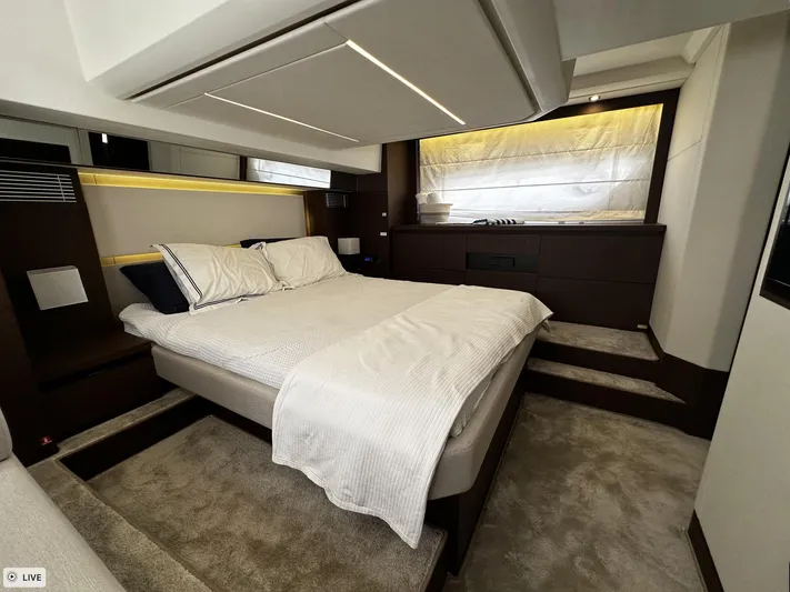  Yacht Photos Pics Luxurious bedroom interior of 2018 Prestige 460S Coupé yacht with modern design.