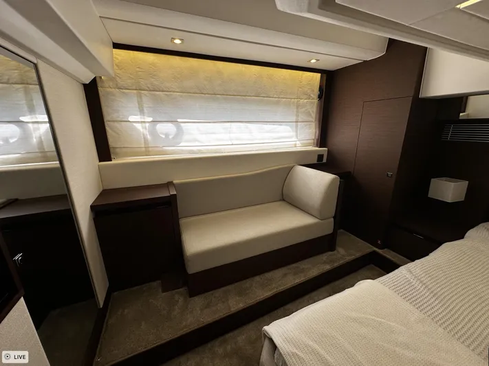  Yacht Photos Pics Luxurious interior of 2018 Prestige 460S Coupé yacht with elegant seating and modern design.