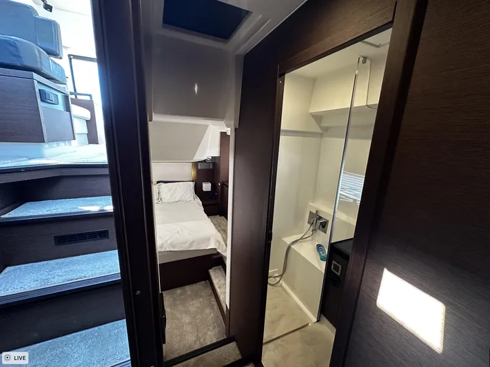  Yacht Photos Pics Interior of 2018 Prestige 460S Coupé yacht, featuring a cozy cabin and modern bathroom.