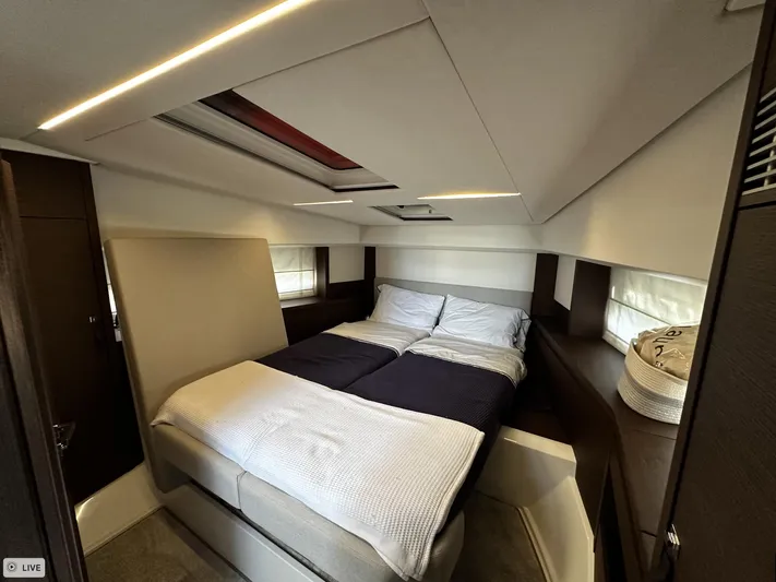  Yacht Photos Pics Luxurious bedroom interior of 2018 Prestige 460S Coupé yacht with modern design.