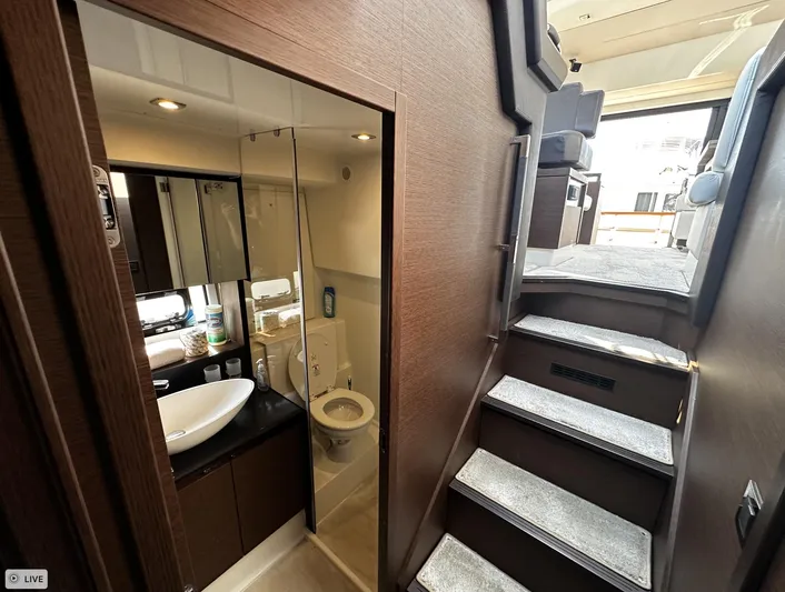  Yacht Photos Pics Interior of 2018 Prestige 460S Coupé yacht featuring a modern bathroom and staircase.