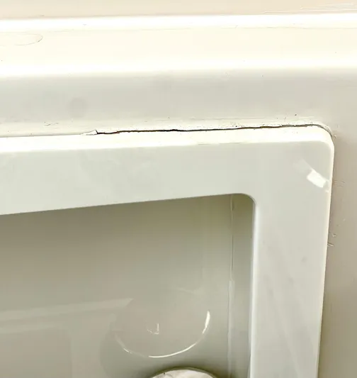 Reel Life Yacht Photos Pics Cracked white surface detail on Jupiter 41SB, 2015 model.