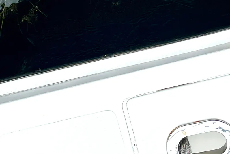 Reel Life Yacht Photos Pics 2015 Jupiter 41SB boat deck with water reflection.