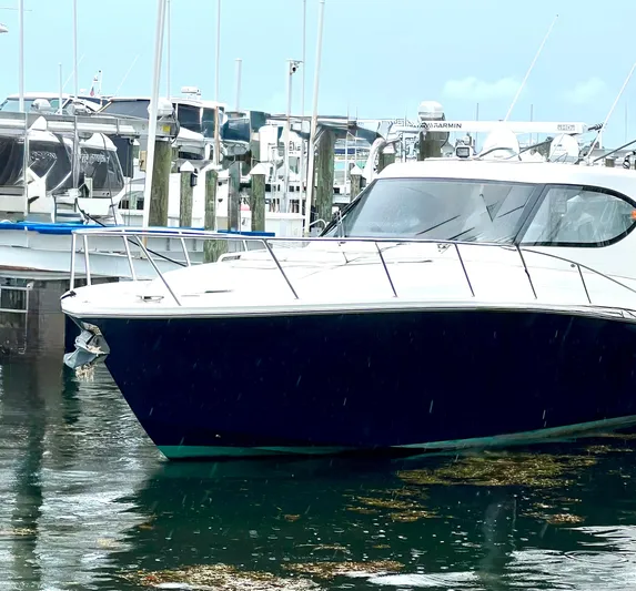 Reel Life Yacht Photos Pics Luxury Jupiter 41SB boat docked in marina, 2015 model, sleek design.